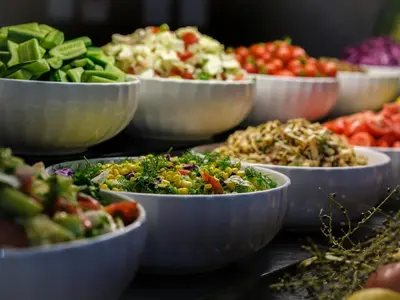 a display of bowls of different types of food at Icon Hotel Bomonti in Istanbul