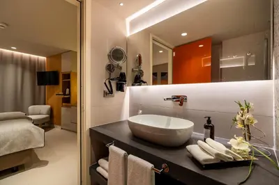 a bathroom with a sink and a mirror at ERK Hotel in Istanbul