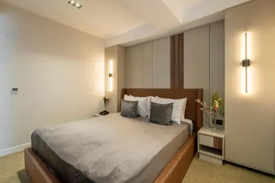 a bedroom with a large bed in a room at Euphrates Hotel Bursa in İhsaniye