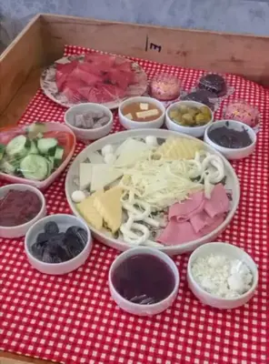 a box filled with different types of food on a table at Club Armada Bungalow Hotel Sapanca in Sapanca