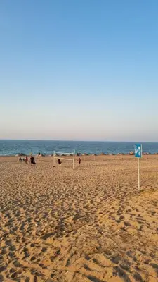a group of people on a beach with the ocean at Close to IST Airport, Sea view& peaceful apartment in Arnavutköy