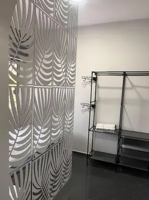 a room with a wall with a partition with aiger at Spacious flat with wide view in Istanbul
