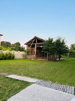 a house that is being built in a yard at Farm Village in Sakarya