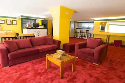 a living room with two couches and a table at Mini Harem Hotel in Istanbul