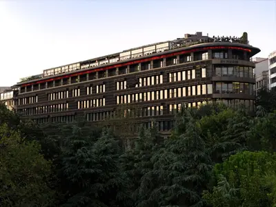 a large building with people sitting on top of it at The St. Regis Istanbul in Istanbul