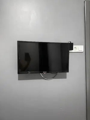 a flat screen tv hanging on a wall at Taksim Plaza Suite in Istanbul