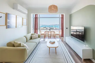 a living room with a couch and a table at Stay Beyond the Bosphorus #5 in Istanbul