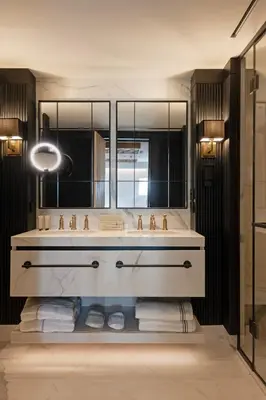 a bathroom with a sink and a mirror at Vakko Hotel Sumahan Bosphorus in Istanbul