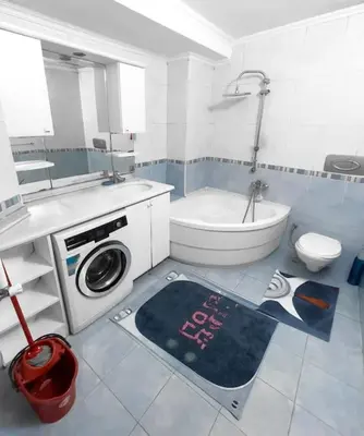 a bathroom with a sink and a toilet and a washing machine at Ground floor apartment in a quiet area 17 in Istanbul