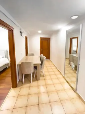 a dining room with a table and chairs at Ground floor apartment in a quiet area 17 in Istanbul