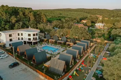an aerial view of a resort with a swimming pool at Kerpe Bungalov Hotel in Kandıra