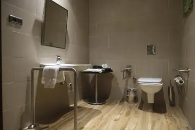 a bathroom with a sink and a toilet at Hilton Garden Inn Corlu in Corlu