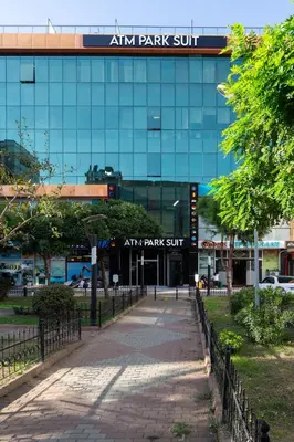a building with a sign that reads aim park stuff at Atm Suit Otel in Istanbul