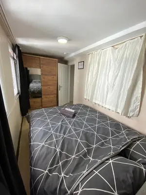 a bedroom with a large bed in a room at ilkim&derin suite in Istanbul