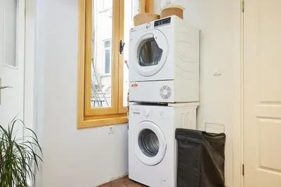 a washing machine and a washer in a room at Stylish 2BR Apt Galata-Taksim Area Near Metro in Istanbul