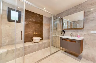 a bathroom with a shower and a sink and a toilet at Port Apart Hotel in Istanbul