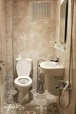 a bathroom with a toilet and a sink at NO PROBLEM OTEL Pansiyon in Tekirdag