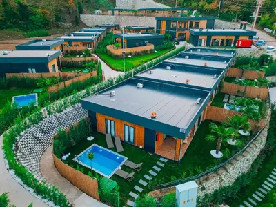an overhead view of a house with a swimming pool at The Green Park Sapanca in Sapanca