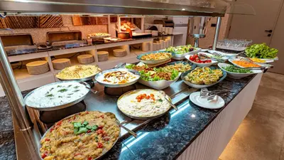 a buffet line with many different types of food at The Green Park Sapanca in Sapanca