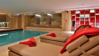 a living room with a swimming pool and a house at Dosso Dossi Hotels & SPA Downtown in Istanbul