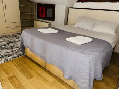 a bedroom with a bed with two towels on it at Yaman suit in Istanbul