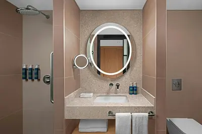 a bathroom with a sink and a mirror at Four Points by Sheraton Istanbul Pendik in Istanbul