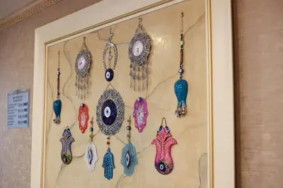 a wall with a bunch of glass ornaments on it at Halifaks Hotel in Istanbul