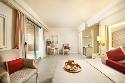 a living room with a couch and a table at Halifaks Hotel in Istanbul