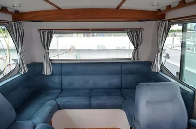 a blue couch in the back of a bus at Vip Bosphorus Tour in Istanbul