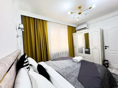 a bedroom with a bed and a couch at Sisli Apartments Holiday231 in Istanbul