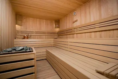 a sauna with wood paneling and a wooden floor at Beyzas Hotels & Suites in Istanbul