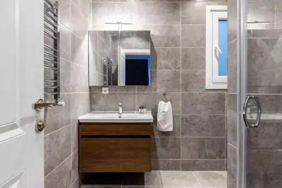 a bathroom with a sink and a shower at Bright Charming Modern 3BD2Bath Balcony! #367 in Istanbul