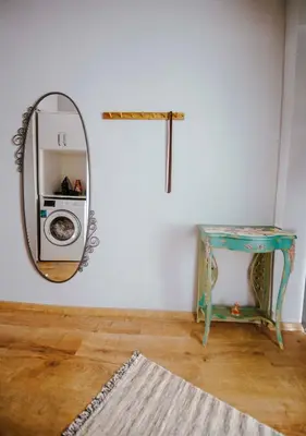 a room with a mirror and a washing machine at A Cozy, Quiet Home with Great View in City Center in Istanbul