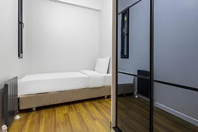 a room with a bed and a mirror at HEARTH OF DOWNTOWN ,LUXURY 1 NEW APARTMENTs in Istanbul