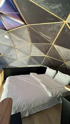 a room with a bed in a room with a wall at Bisanthe Panorama in Kumbağ