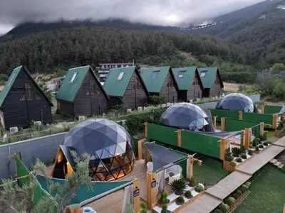 an aerial view of a farm with domes and houses at Bisanthe Panorama in Kumbağ