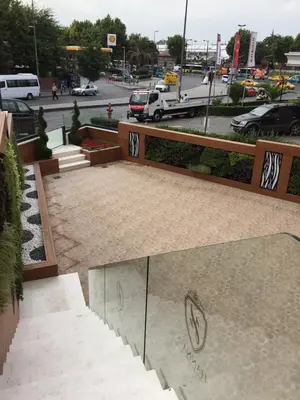 a skateboard ramp in a parking lot with a parking lot at Hanna Hotel in Istanbul