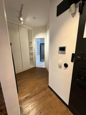 an empty room with a hallway with a wooden floor at Doctors Spacious Place in Istanbul
