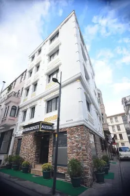 a white building on the corner of a street at Alessia Old City in Istanbul