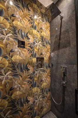 a bathroom with a wall with a mural of flowers at Hotel Flash in Istanbul