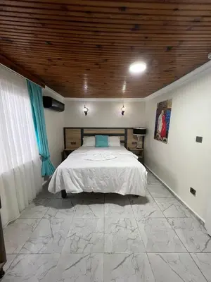 a bedroom with a bed and a wooden ceiling at Sultanahmet Sefa Hotel in Istanbul