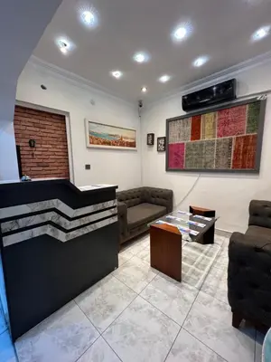 a living room with a couch and a table at Sultanahmet Sefa Hotel in Istanbul