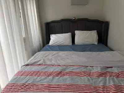 a bed with two pillows on top of it at Modern Suites Galata in Istanbul