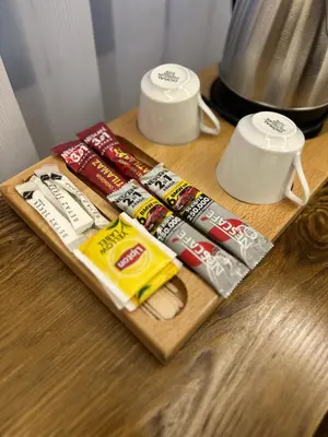 a table with some food on a cutting board at Lokka Hotel Ortakoy in Istanbul