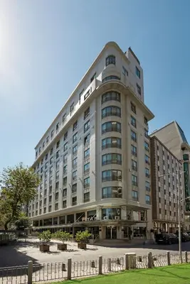 a large building with a lot of windows at Titanic City Taksim in Istanbul