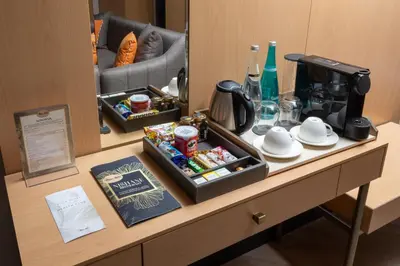 a table with a tray of food and a coffee maker at Me by Mula in Istanbul