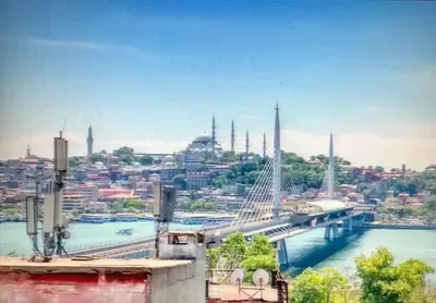 a view of a bridge over a river with a city at Perla Galata Hotel in Istanbul