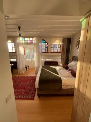 a bedroom with a large bed in a room at Levant Pension de Luxe in Istanbul