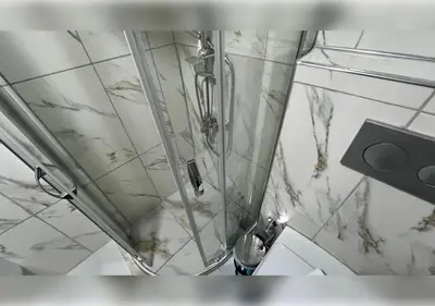 a shower in a bathroom with a marble ceiling at Anka Boutique Hotel in Istanbul