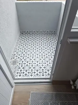 a hallway with a tile floor in a room at Evinizin Konforunu Yaşayın ! in Istanbul